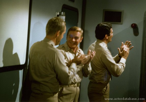Robert, Richard Basehart and David Hedison applaud The Deadly Dolls