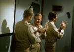 Robert, Richard Basehart and David Hedison applaud The Deadly Dolls
